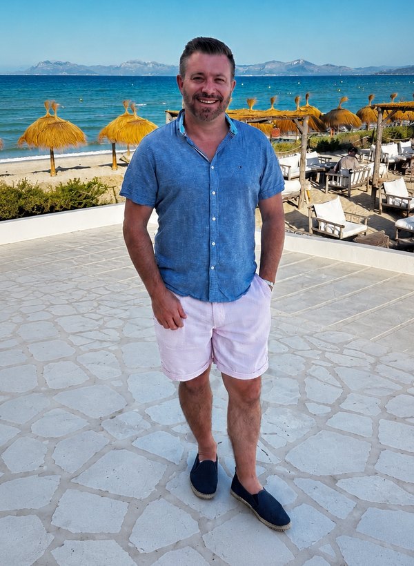 James O'Sullivan on a terrace above a beach in Mallorca